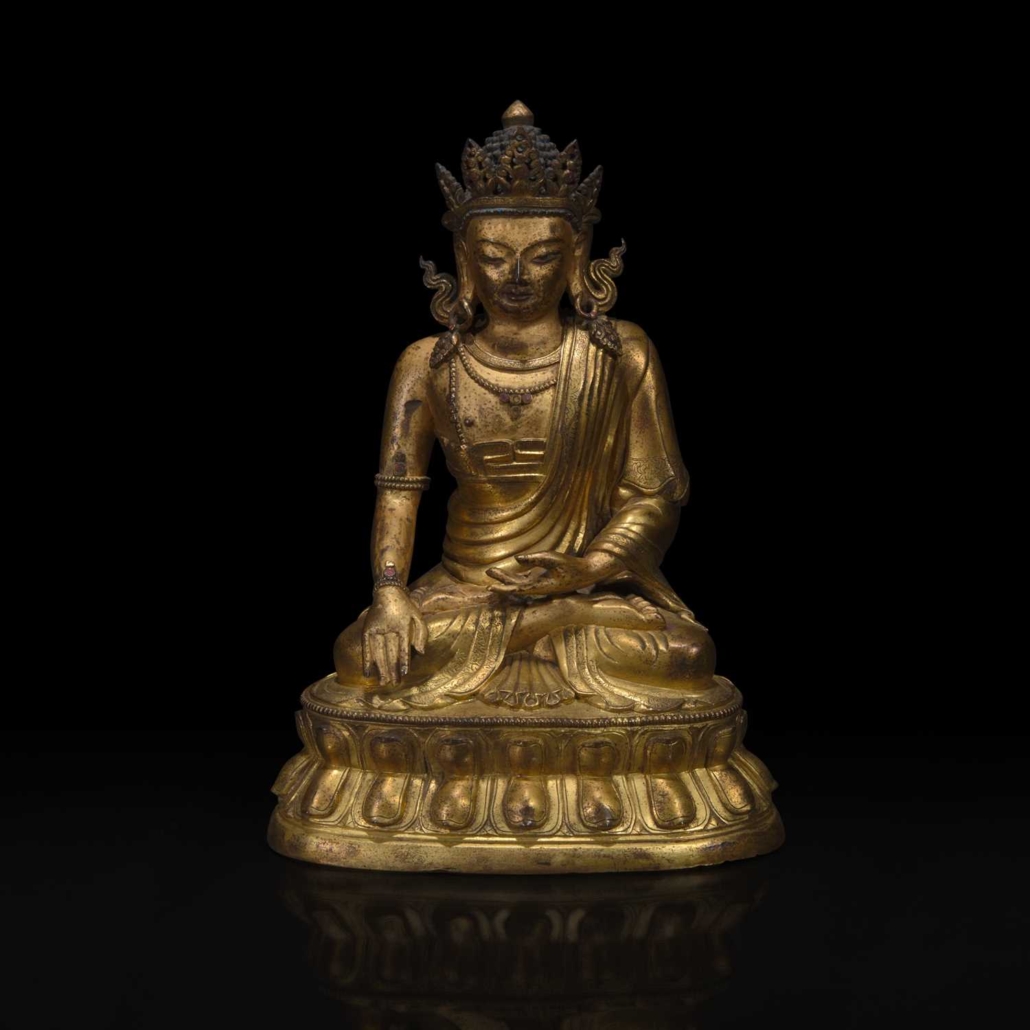 Sino-Tibetan gilt bronze figure of Akshobhya, $30,240