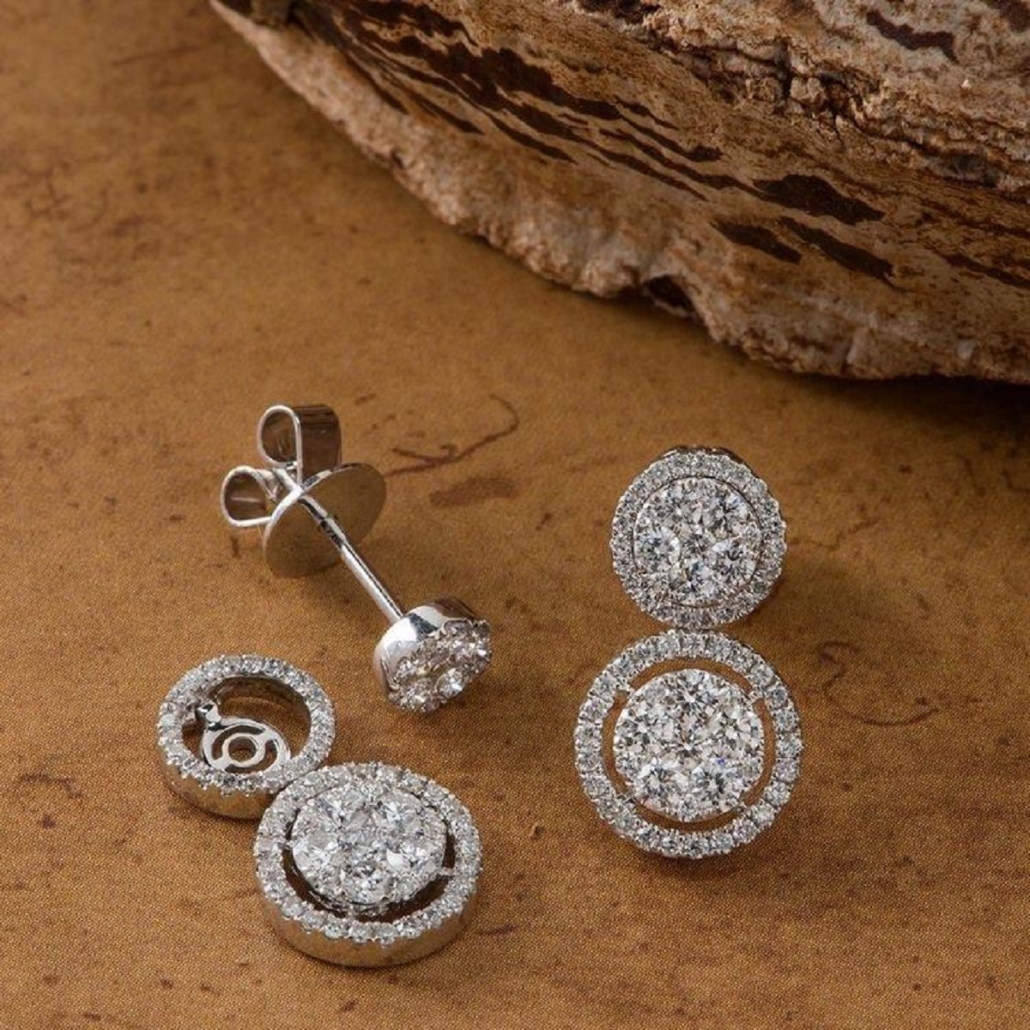 Pair of 18K gold and diamond earrings, est. $1,000-$8,000