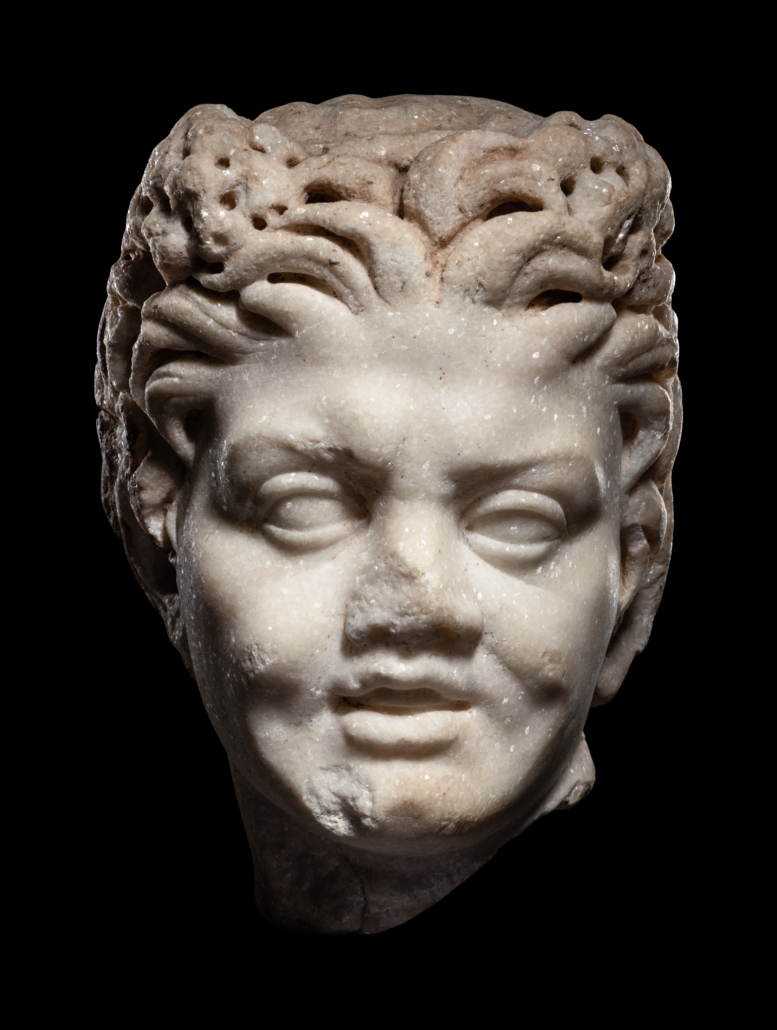 Marble portrait head of a youthful satyr, est. $40,000-$60,000