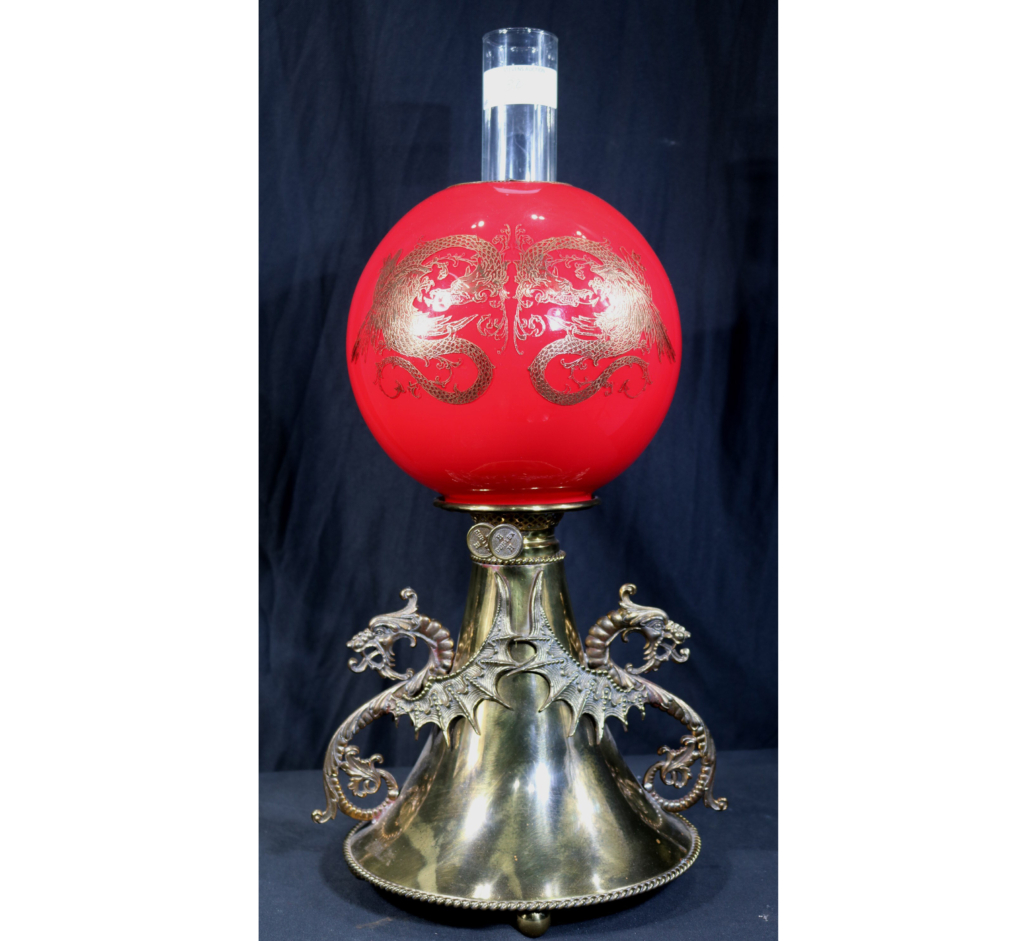 Brass Victorian lamp by Bradley and Hubbard, est. $1,000-$3,000