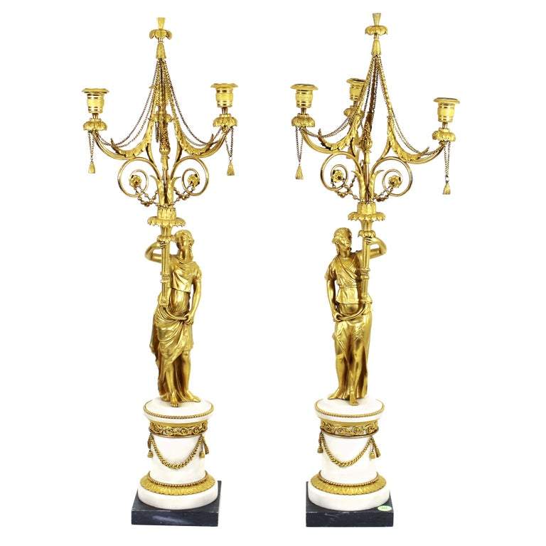 French Louis XVI omolu and marble candelabras, est. $10,000-$20,000 
