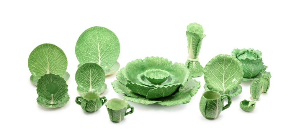 A 104-piece Dodie Thayer lettuce ware service that included a spoon rest, candlesticks, and a serving bowl, achieved $32,500 plus the buyer’s premium in April 2021. Image courtesy of Hindman and LiveAuctioneers