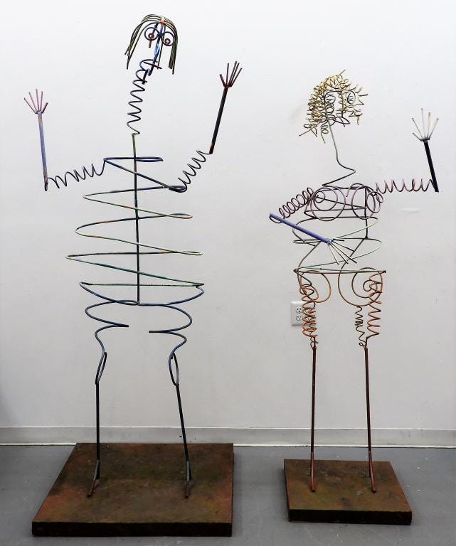 Pair of life-size figural kinetic metal sculptures, est. $800-$1,200