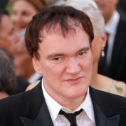 Quentin Tarantino attending the 82nd Academy Awards ceremony in March 2010. Image courtesy of WikiMedia Commons, photo credit Sgt. Michael Connors. This file is a work of a U.S. Army soldier or employee, taken or made as part of that person's official duties. As a work of the U.S. federal government, it is in the public domain in the United States. The Image was modified by SalomeW.