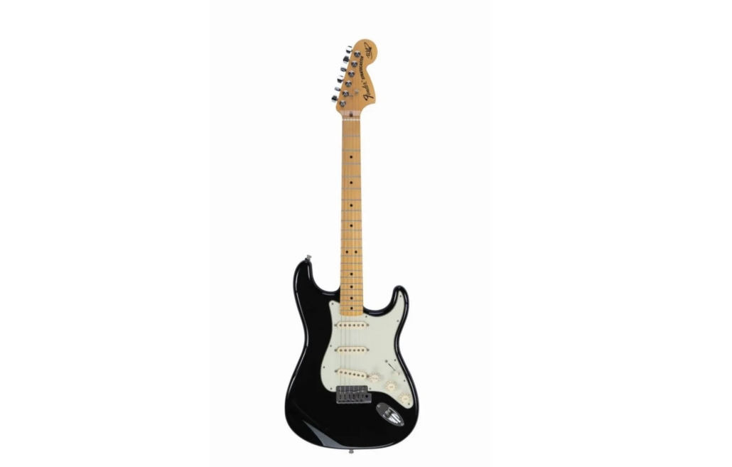 The second of two stage-played guitars consigned by The Edge to the charity auction is a custom signature Fender Stratocaster. He performed with it between 2017 and 2019, using it for live renditions of ‘Bad’ and ‘Still Haven’t Found What I’m Looking For.’