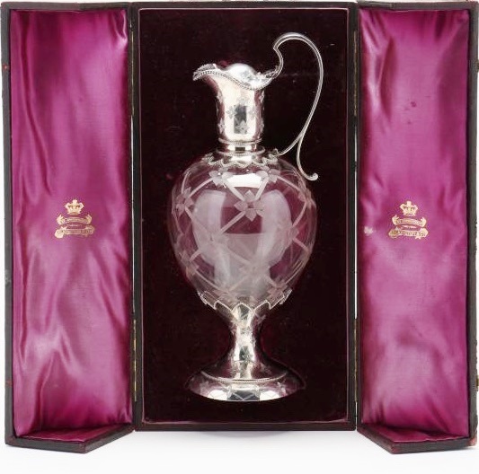 Silver and cut glass wine vessel in its original silk-lined case, est. $2,500-$5,000