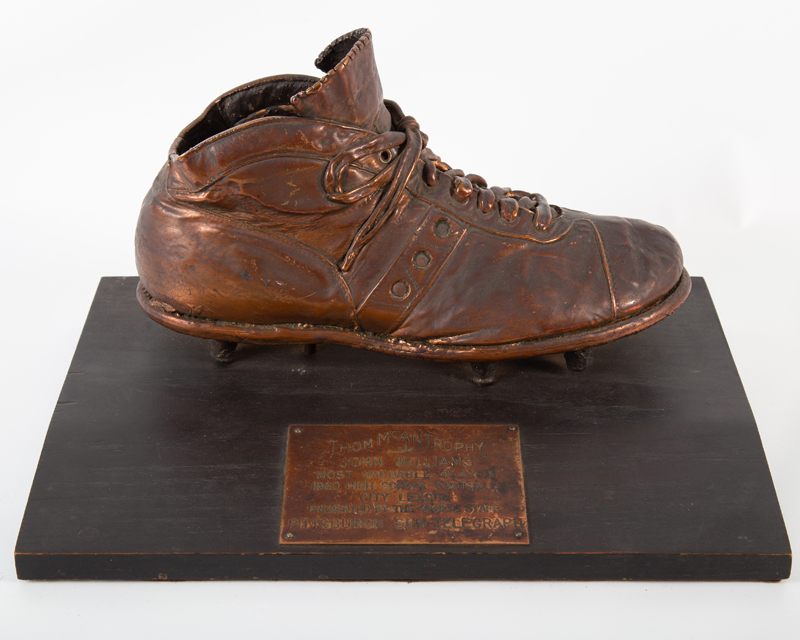 1960 high school football trophy with bronzed shoe, est. $50-$100