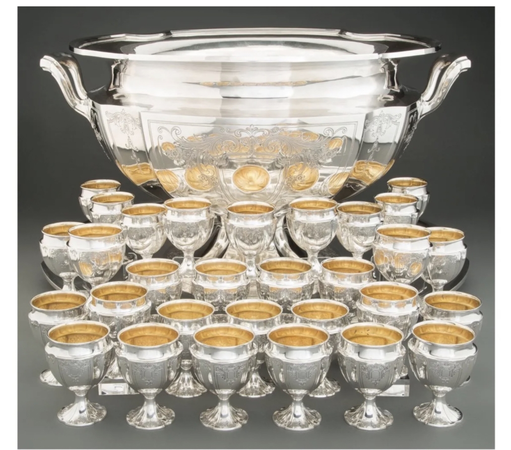 Detail shot of a 1933 Reed & Barton partial-gilt silver punch service, showing all 30 cups. The service realized $22,000 in November 2020. Image courtesy of Heritage Auctions and LiveAuctioneers 