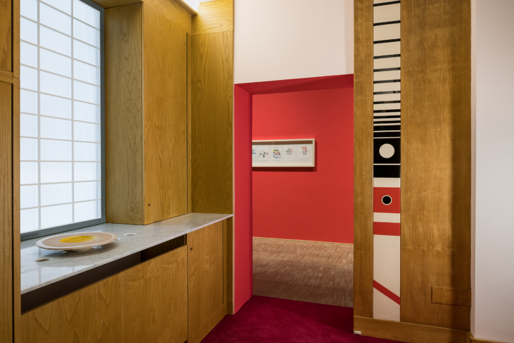 Image showing another angle on the Sala Sottsass display, a faithful reconstruction of an interior of Casa Lana, a private Milan residence Ettore Sottsass designed in the mid-1960s. © Trienniale Milano. Photo credit Gianluca Di Ioia