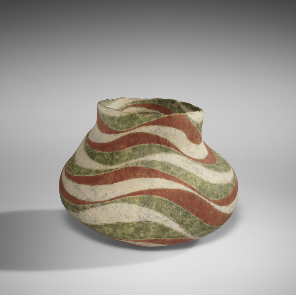 Kamoda Shoji, Jar, 1971. Stoneware with red and green painted glazes. 4 ½ in by 6 ½ in. Photo credit: Collection of Joan B. Mirviss and Robert J. Levine