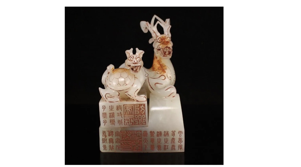 Pair of jade Chinese Hetian divine beast seals, est. $3,000-$3,500