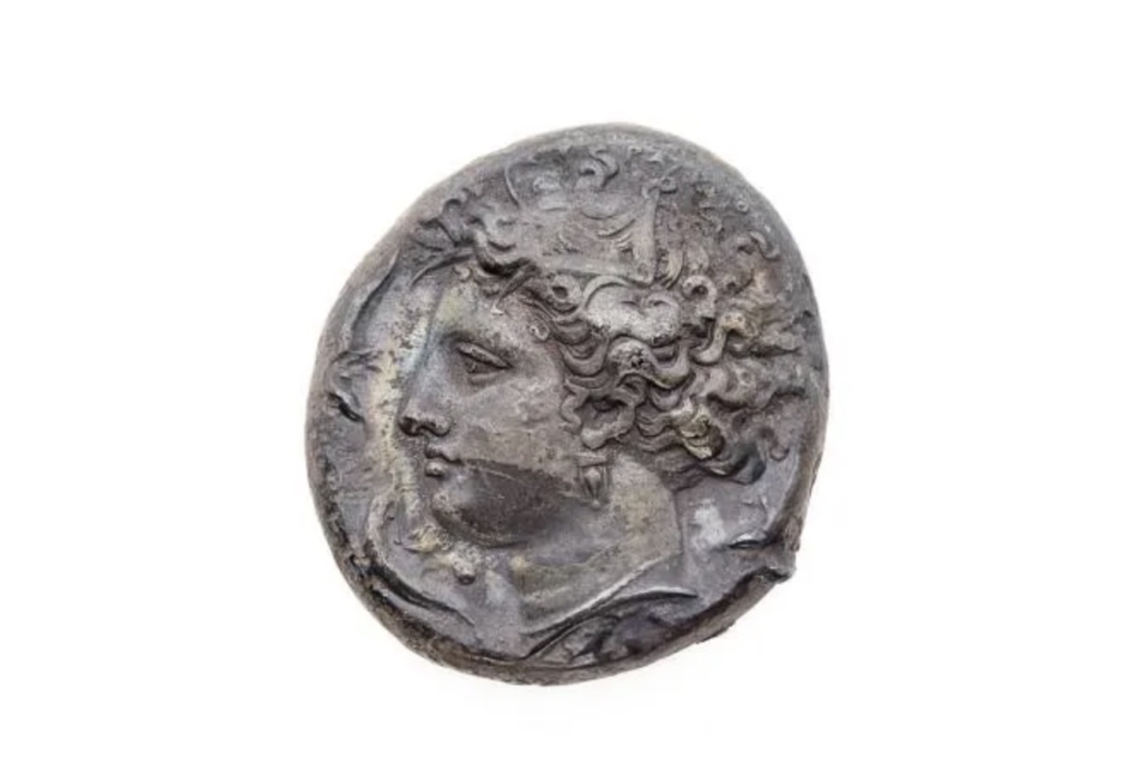  Sicily, Syracuse, circa 405-395 BCE and possibly later, AR Dekadrachm, unsigned dies in the style of the artist Euainetos. Est. $25,000-$35,000