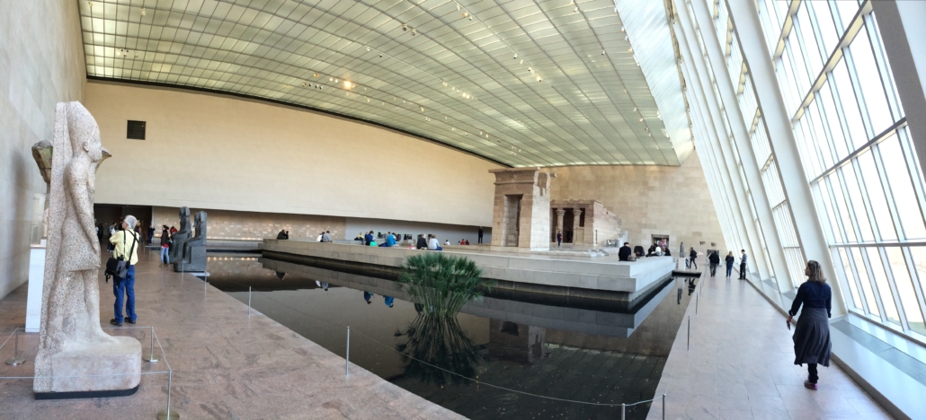 April 2017 panoramic image of the space in the Sackler Wing of the Metropolitan Museum of Art that houses the Temple of Dendur. The Met and the Sacklers announced on December 10, 2021 that the family name would be removed from the museum building. Image by Paulo JC Nogueira, courtesy of Wikimedia Commons and shared under the Creative Commons Attribution-Share Alike 3.0 Unported license.