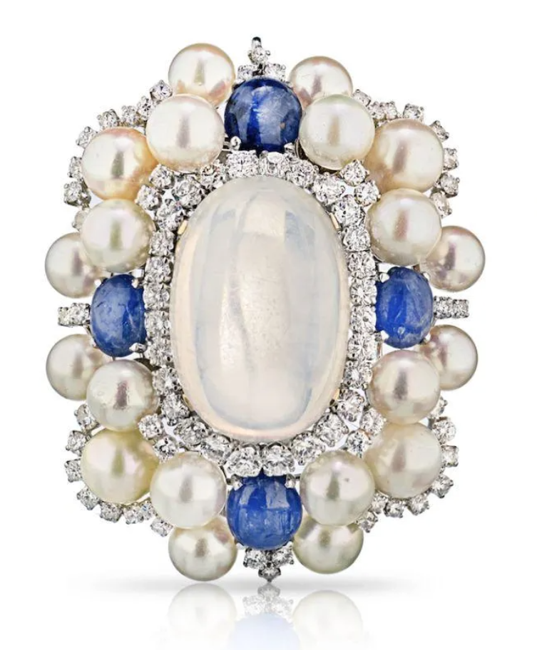 A circa-1960s David Webb moonstone brooch with sapphires and diamonds realized $24,000 plus the buyer’s premium in November 2020 at Bidhaus. Image courtesy of Bidhaus and LiveAuctioneers