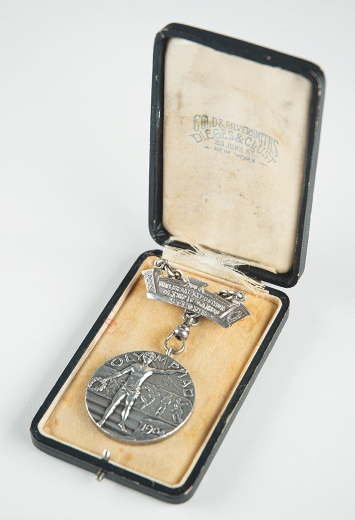  St. Louis 1904 Olympic silver medal for the long jump, awarded to Daniel Frank, shown in its case, est. $75,000-$100,000