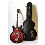 Ibanez semi-hollow ES335 model with Gibson Lucille hard case, est. $900-$1,200