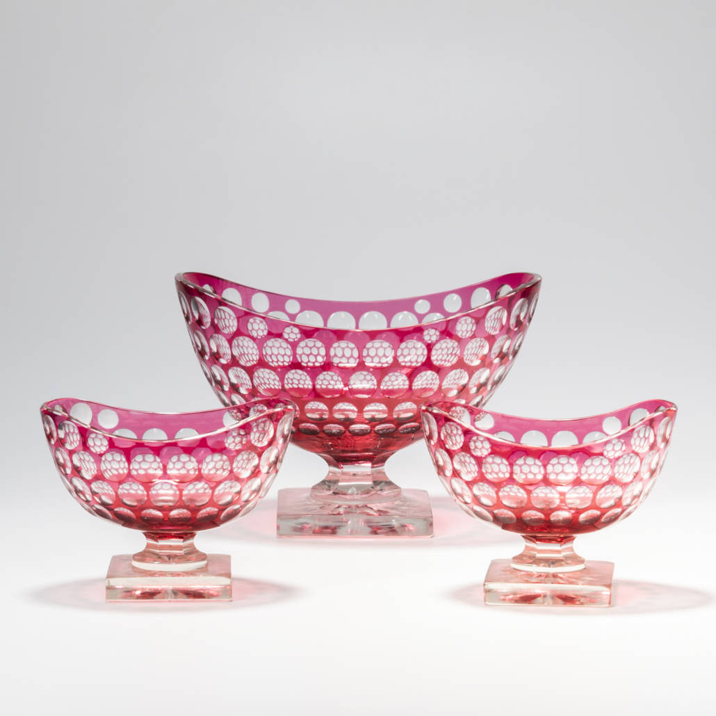 Three-piece Steuben polka-dot pattern glass garniture, est. $2,000-$3,000. Image courtesy of Skinner