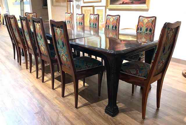 Louis Majorelle dining table and set of 12 chairs, est. $4,000-$7,000