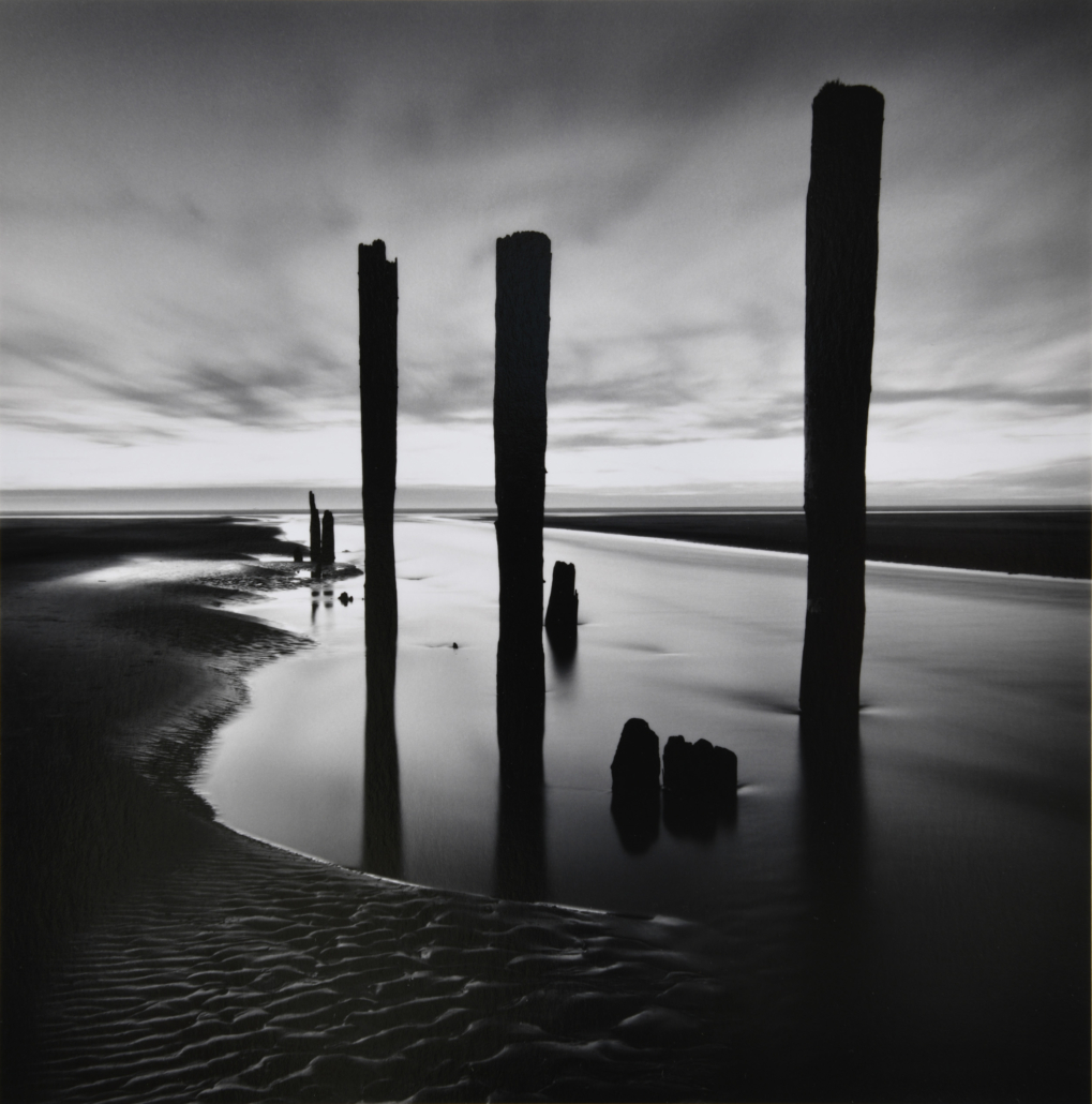 Michael Kenna, ‘Last Pier Posts, Pacific Beach, Washington, USA. 2013,’ printed 2018. Gelatin silver print, 7.75in by 7.75in., Hallie Ford Museum of Art, Willamette University, Salem, Ore., The Bill Rhoades Collection, donated by Michael Kenna and Bill Rhoades, 2021.023.001