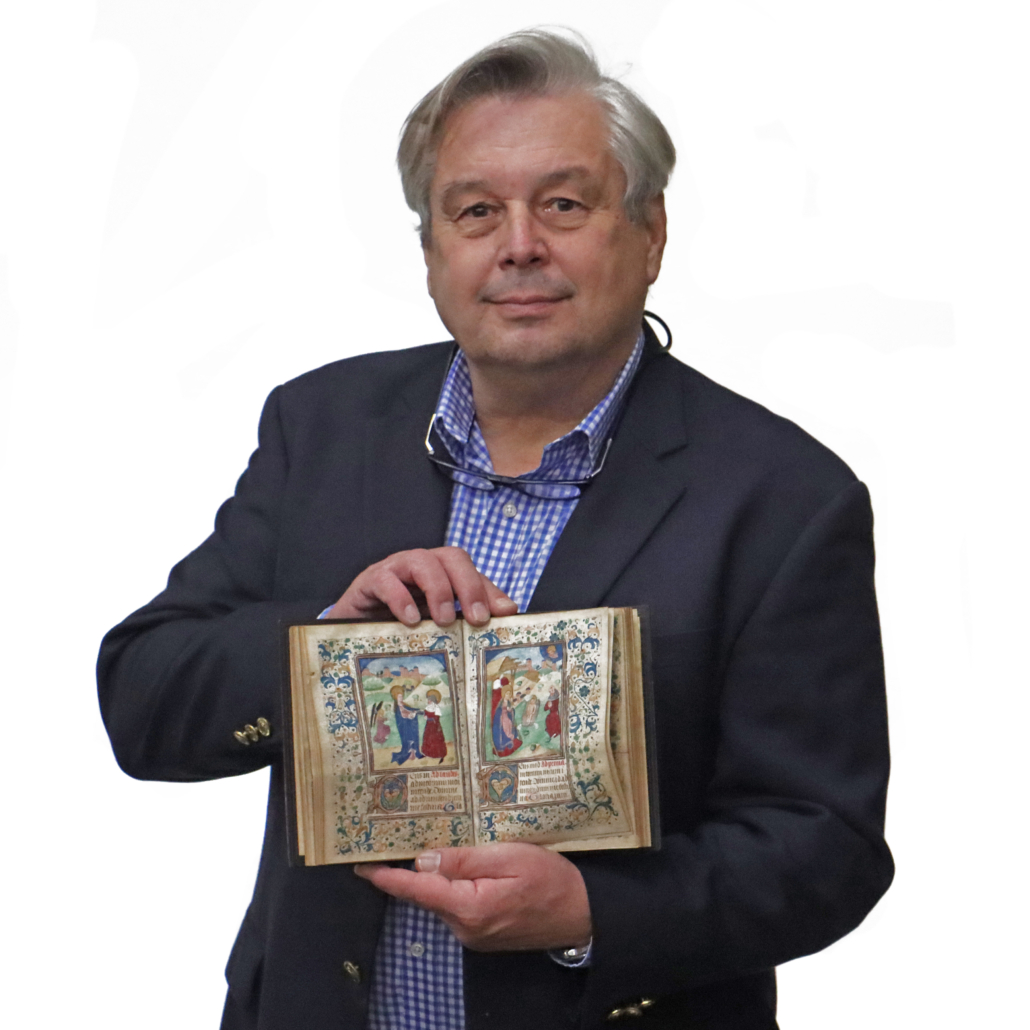  Stephen Turner holds a Book of Hours offered in a January 2022 auction that realized $14,000 plus the buyer’s premium. Image courtesy of Turner Auctions + Appraisals.