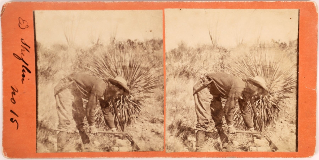 Stereo view of gold miner Ed Schieffelin, founder of Tombstone, Arizona, breaking a rock with a pick, $3,125
