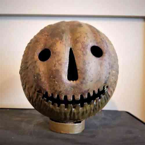 Circa-1910 tin pumpkin head Halloween lantern, est. $1,500-$2,000
