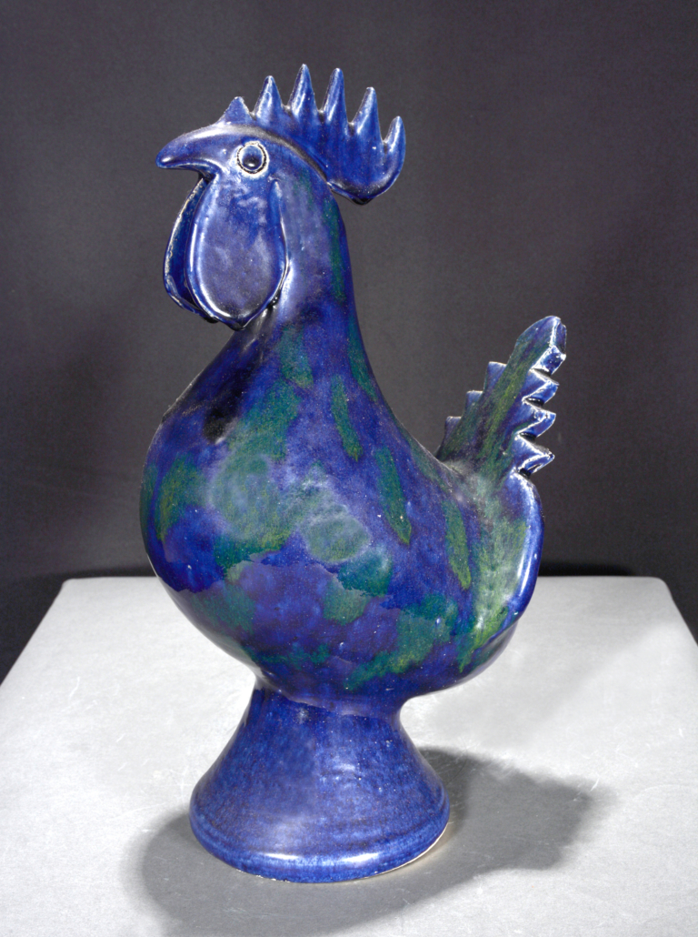 Edwin Meaders 1998 rooster decorated with green drips on a cobalt blue-painted form, est. $800-$1,200