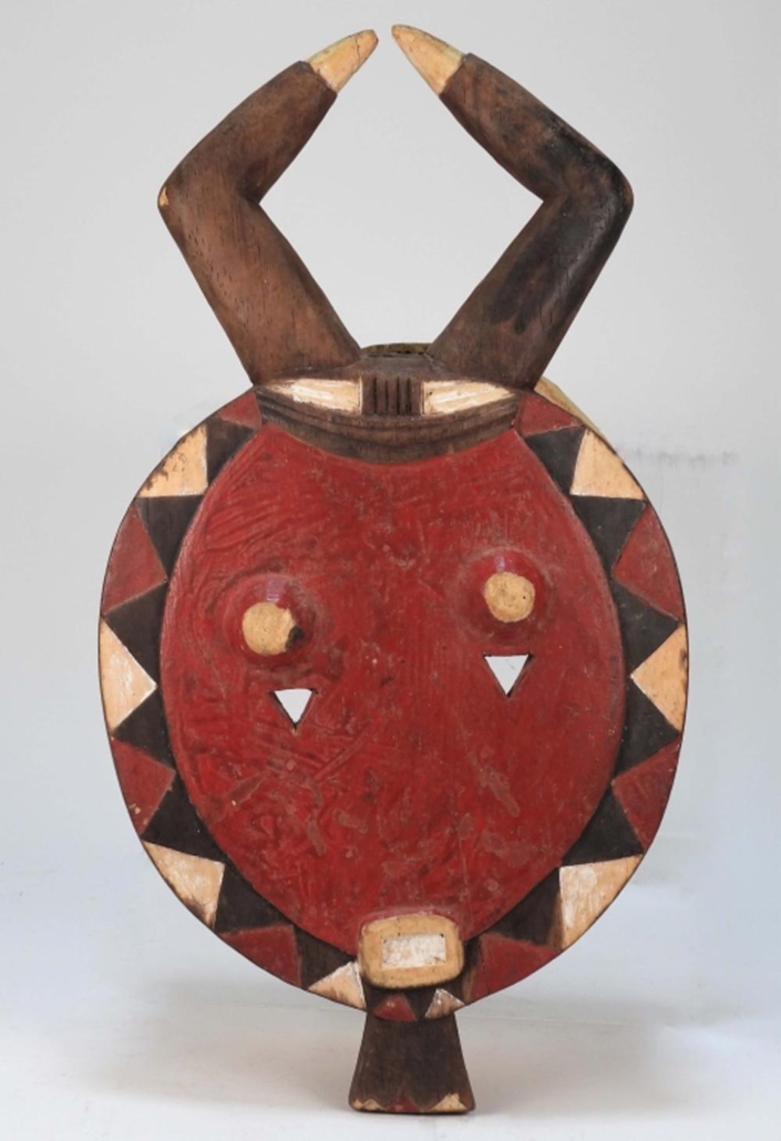 Early 20th-century African Baule tribe Kplekple carved wood mask, est. $2,000-$3,000
