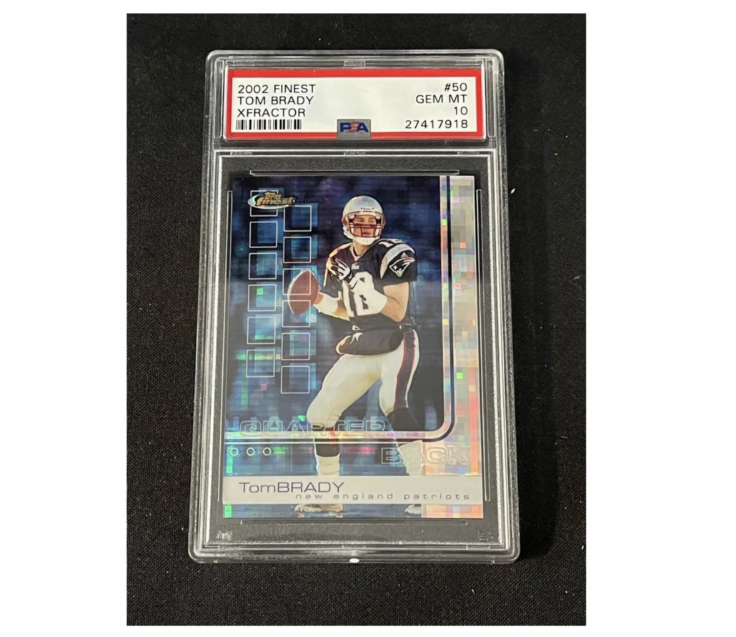 A 2002 Topps Finest X-Fractor Tom Brady card, one of only 20 made and boasting a PSA grade of 10, achieved $120,000 plus the buyer's premium in January 2022. Image courtesy of Saco River Auction and LiveAuctioneers