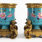 Pair of porcelain bronze mounted urns attributed to Sevres and Victor Paillard, est. $4,000-$6,000