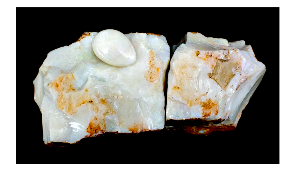 The opal is larger than a brick and is broken into two pieces, which consigner Fred von Brandt said was a practice used decades ago to prove gem quality. Image courtesy of Alaska Premier Auctions & Appraisals and LiveAuctioneers.