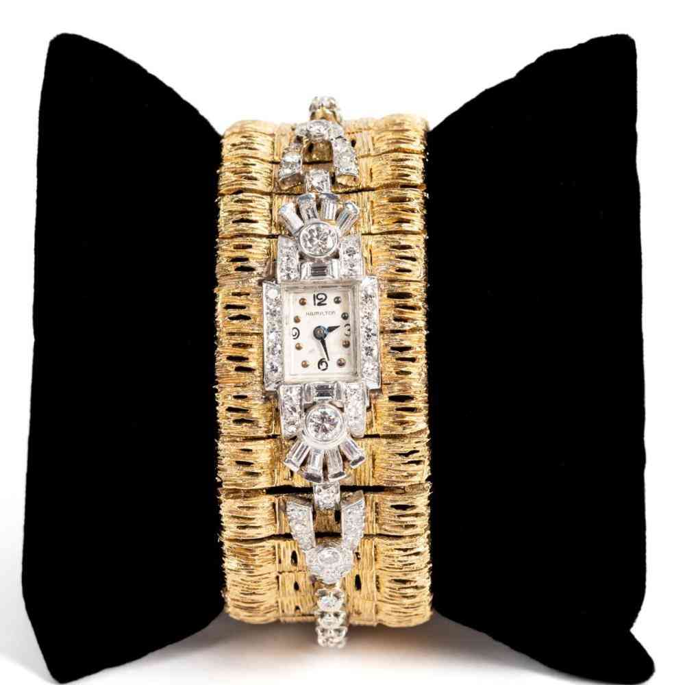 Textured wide 14K yellow gold bracelet with attached diamond watch, est. $2,000-$4,000