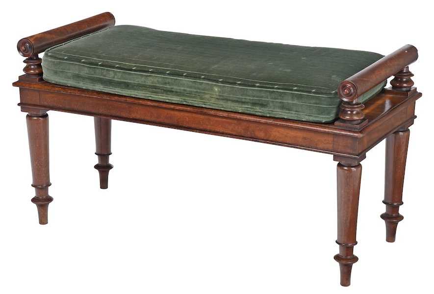 Circa-1825 figured mahogany window bench, which sold for $2,200 plus the buyer’s premium in November 2023. Image courtesy of Brunk Auctions and LiveAuctioneers.