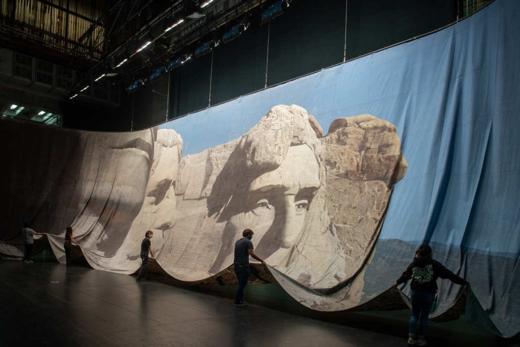‘North by Northwest,’ Mount Rushmore (91 by 30ft) MGM (1959). UT- Austin students raise backdrop for assessment, Photo: Sandy Carson