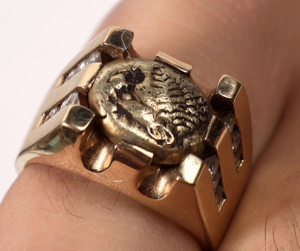 Men’s gold ring set with an ancient gold coin, $3,250