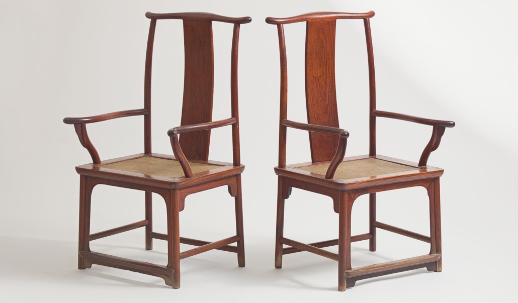  Pair of Chinese huanghuali armchairs, est. $80,000-$120,000