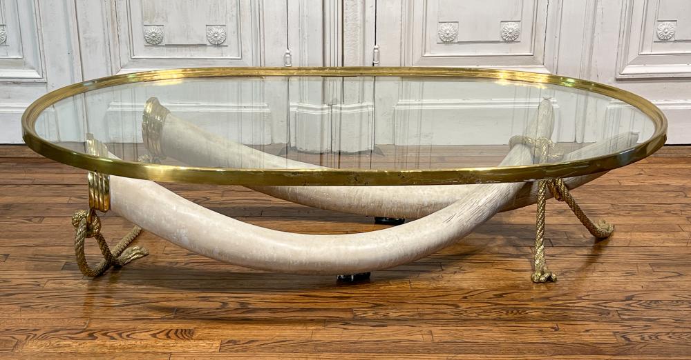 Italo Valenti bronze faux tusk cocktail table, est. $100-$25,000