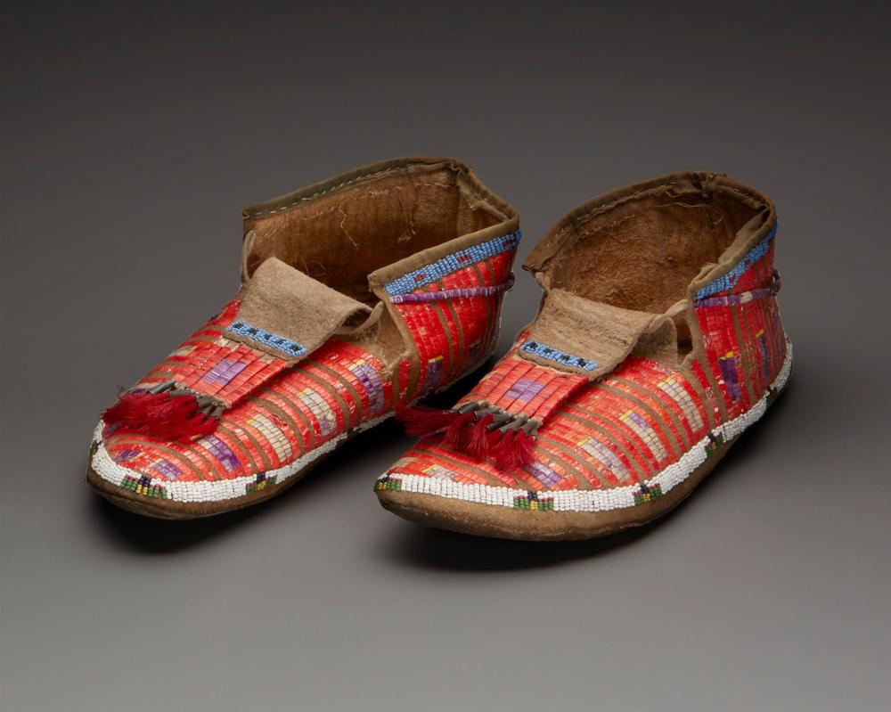 Pair of Sioux beaded and quilled hide moccasins, $2,125
