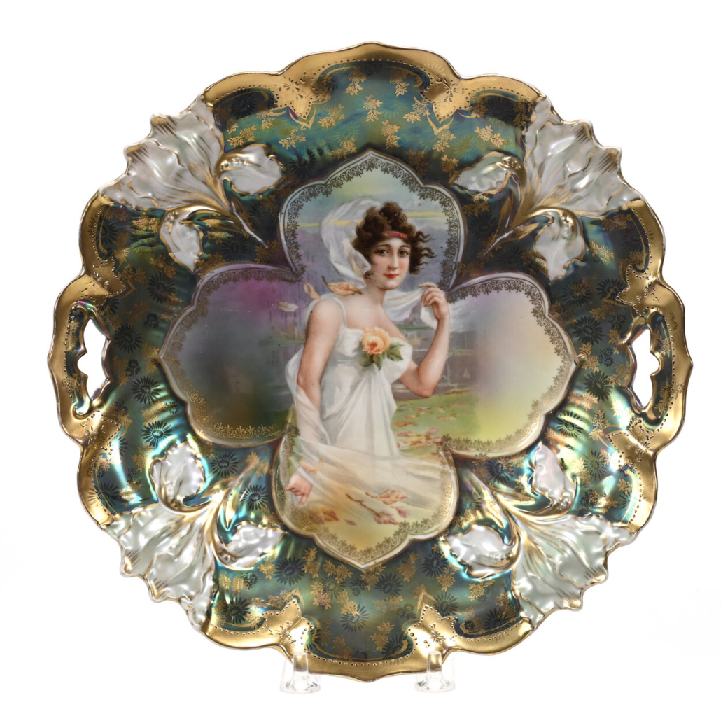 R.S. Prussia cake plate in the Iris mold with a fall season portrait decor and a iridescent Tiffany border, $3,000