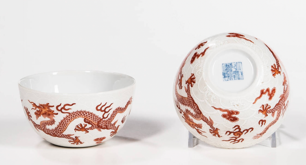 Pair of iron red dragon bowls, est. $3,000-$5,000. Image courtesy of Skinner