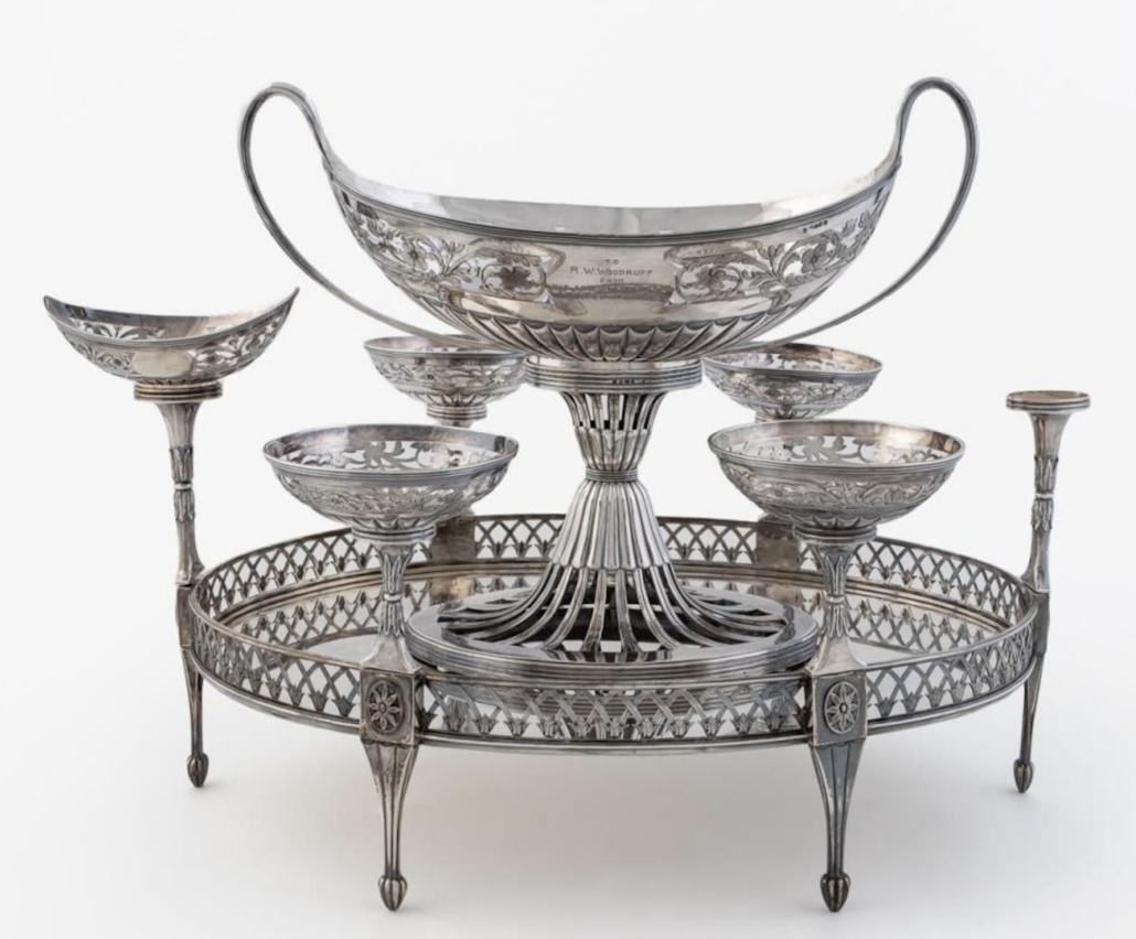 Seven-piece George III neoclassical Adams sterling silver oval epergne centerpiece, $12,500