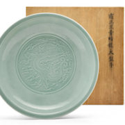 Large Chinese celadon-glazed porcelain dragon charger, est. $80,000-$120,000