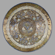 Islamic earthenware plate with birds and inscriptions, made in Kashan, Iran, in 1218. Image courtesy of the Walters Art Museum. Photo credit: Susan Tobin