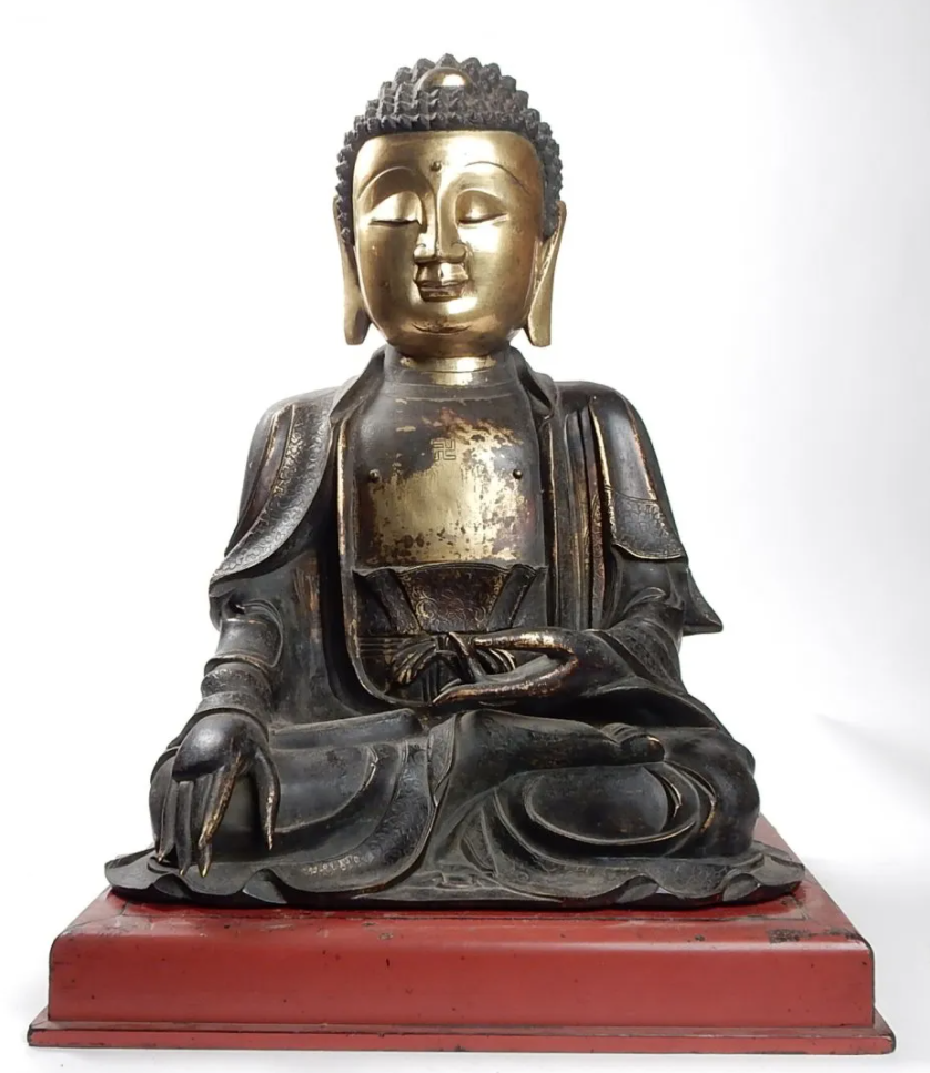 Among the top-selling items in the auction house’s history is this early Chinese bronze of a buddha seated in the Abhaya Mudra position, which attained $300,000 in June 2014. Image courtesy of Roland Auctions NY and LiveAuctioneers.
