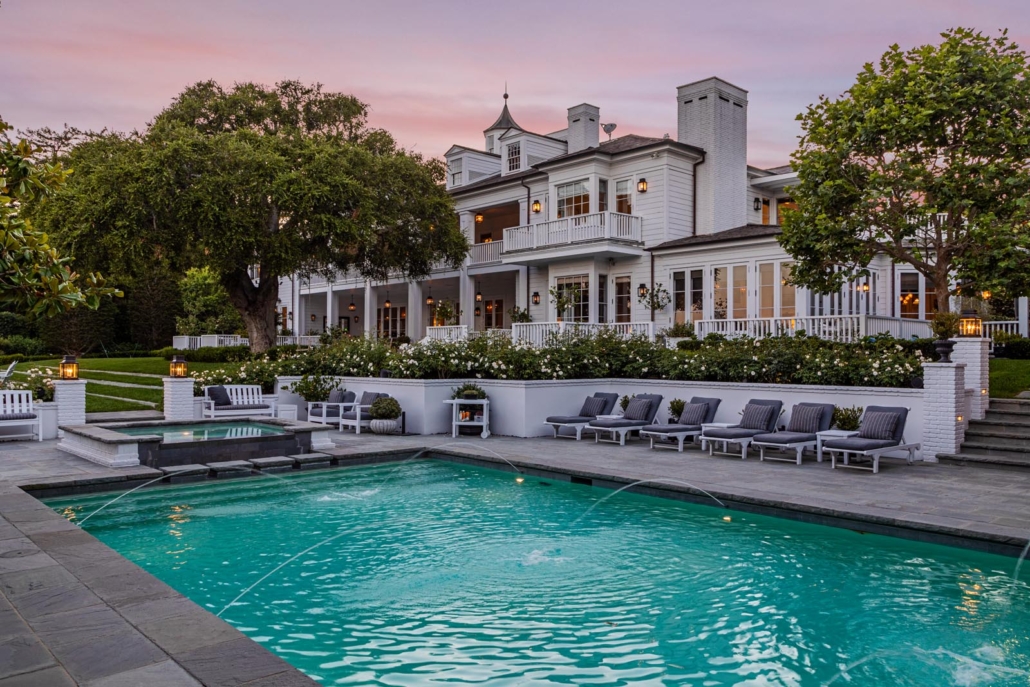  The handsome Georgian Colonial-style home features a generously-sized swimming pool. Photo credit: The Agency 2019. Courtesy of TopTenRealEstateDeals.com