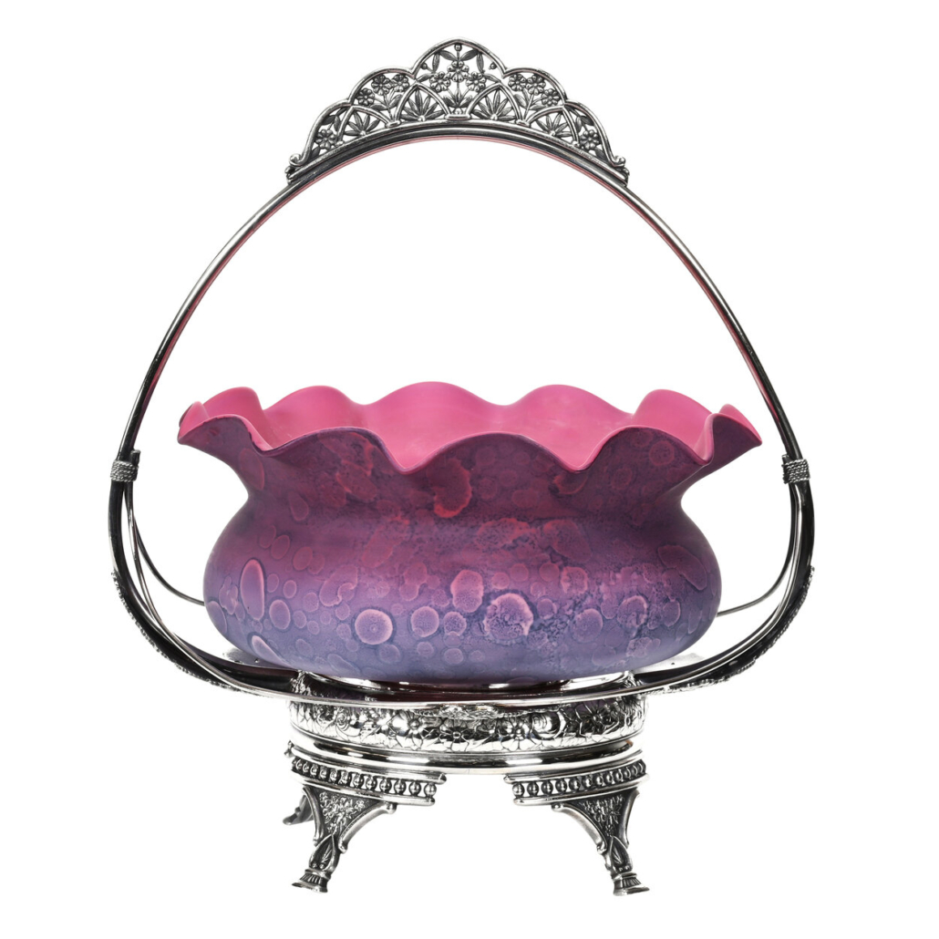 Agata art glass bowl with pink to lavender coloring, offered with a Reed & Barton #968 silverplate frame, est. $1,500-$3,000