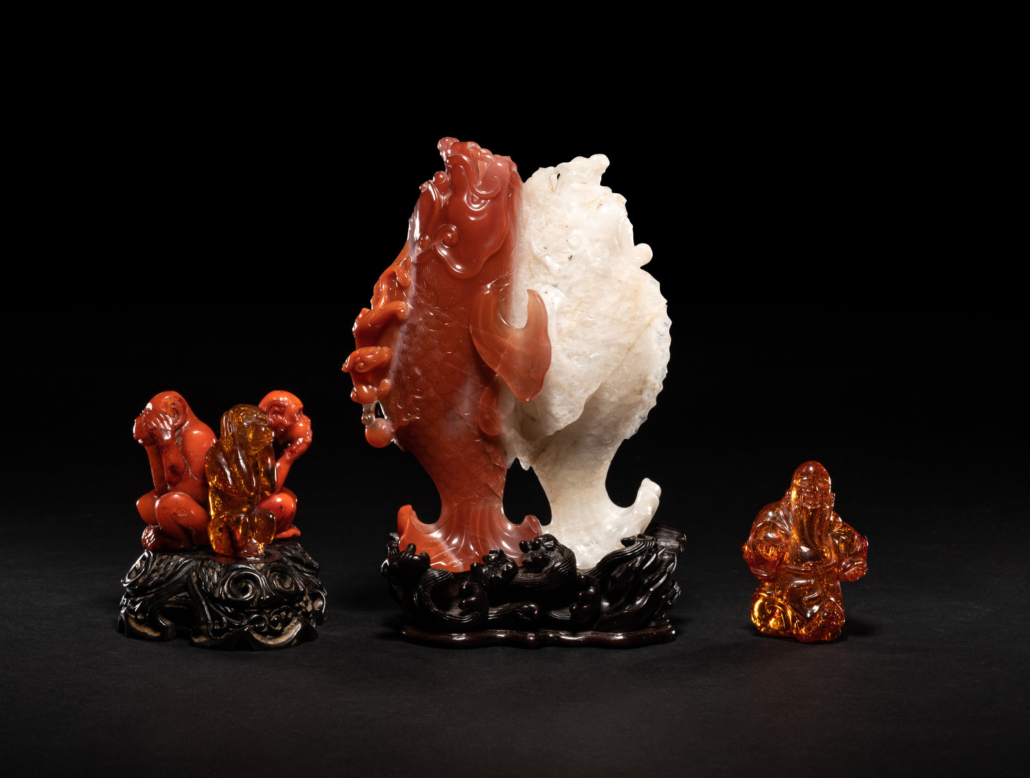 Two Chinese amber carvings and an agate carving of double fish, $62,500
