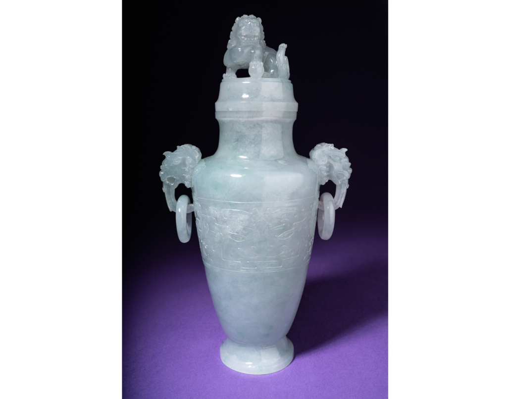 Translucent grayish-celadon jadeite covered vase, $81,250