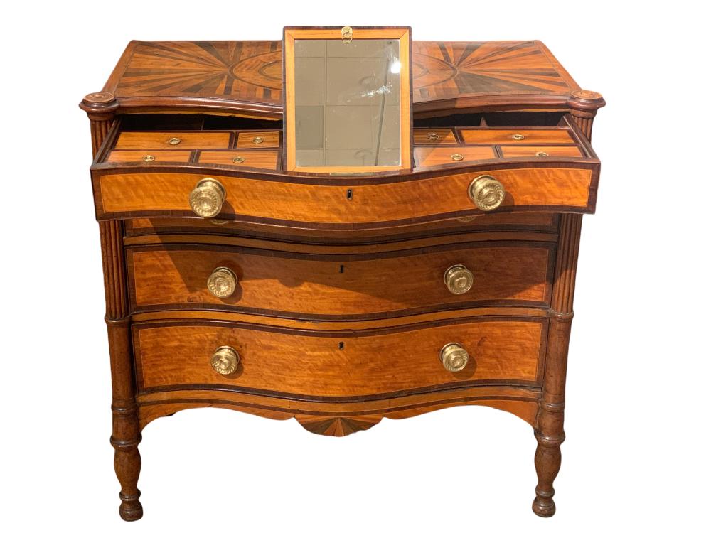 Regency inlaid satinwood and mahogany dressing cabinet, $9,840
