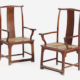 Pair of Chinese huanghuali armchairs, $948,000